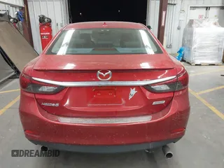 2016 Mazda 6 i Grand Touring с VIN JM1GJ1W50G1474054, выставлен на аукционе IAAI как лот 42162163 с пробегом 97 169 миль миль и . История ставок и продаж доступна на DreamBid. Изображение 16.