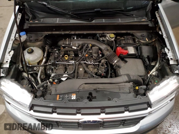 2022 Ford Maverick XL z VIN 3FTTW8F9XNRA76767, wystawiony jako Copart lot #60539205 z przebiegiem 25 082 mil mil oraz Szkoda całkowita • Salvage title. Historia ofert i sprzedaży dostępna na DreamBid. Obrazek 11.