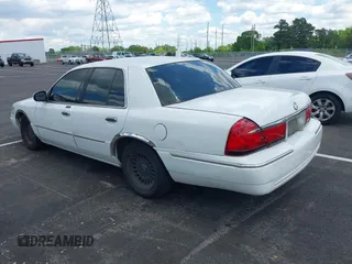 2001 Mercury Grand Marquis LS with VIN 2MEFM75W71X614856, listed as a IAAI auction lot 42195921 with 113,352 mi miles and . Bid and sale history available at DreamBid. Image 3.