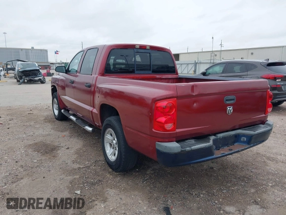 2006 Dodge Dakota SLT with VIN 1D7HE48KX6S598831, listed as a IAAI auction lot 41292884 with 173,181 mi miles and . Bid and sale history available at carsss.com. Image 3.