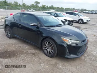 2014 Scion tC z VIN JTKJF5C76E3078256, wystawiony jako IAAI lot #42437930 z przebiegiem 239 399 mil mil oraz . Historia ofert i sprzedaży dostępna na DreamBid. Obrazek 1.
