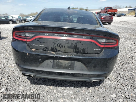 2018 Dodge Charger SXT Plus with VIN 2C3CDXHG2JH329120, listed as a Copart auction lot 49746455 with 106,182 mi miles and Salvage Title. Bid and sale history available at carsss.com. Image 6.