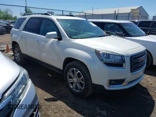 2014 GMC Acadia SLT z VIN 1GKKRRKD3EJ219690, wystawiony jako IAAI lot #42221261 z przebiegiem 103 675 mil mil oraz . Historia ofert i sprzedaży dostępna na DreamBid. Obrazek 1.