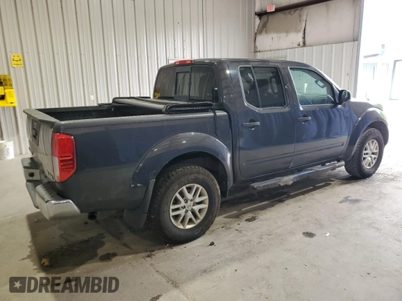 2015 Nissan Frontier Pro-4X with VIN 1N6AD0EV3FN732242, listed as a Copart auction lot 54837815 with 215,576 mi miles and Clean title. Bid and sale history available at DreamBid. Image 3.