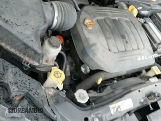 2014 Dodge Grand Caravan SE with VIN 2C4RDGBGXER335472, listed as a IAAI auction lot 43527980 with 135,720 mi miles and . Bid and sale history available at DreamBid. Image 16.