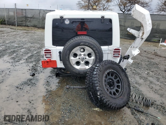 2013 Jeep Wrangler Sahara z VIN 1C4AJWBG7DL512437, wystawiony jako Copart lot #48928325 z przebiegiem Nie podano mil oraz Szkoda całkowita • Salvage title. Historia ofert i sprzedaży dostępna na DreamBid. Obrazek 6.
