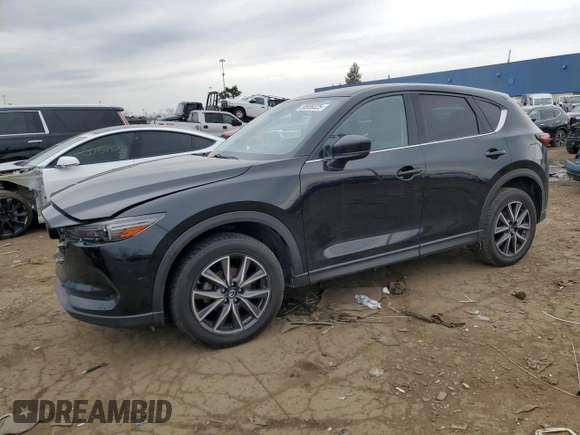 2017 Mazda CX-5 Grand Touring with VIN JM3KFBDL8H0102060, listed as a Copart auction lot 50938325 with 71,868 mi miles and Clean Title. Bid and sale history available at carsss.com. Image 1.