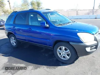 2005 Kia Sportage LX with VIN KNDJF723457057402, listed as a IAAI auction lot 41471742 with 215,565 mi miles and . Bid and sale history available at carsss.com. Image 13.