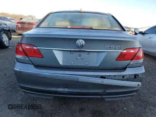 2006 BMW 7 Series 750i with VIN WBAHL83596DT03728, listed as a Copart auction lot 87855795 with 127,513 mi miles and Salvage title. Bid and sale history available at DreamBid. Image 6.
