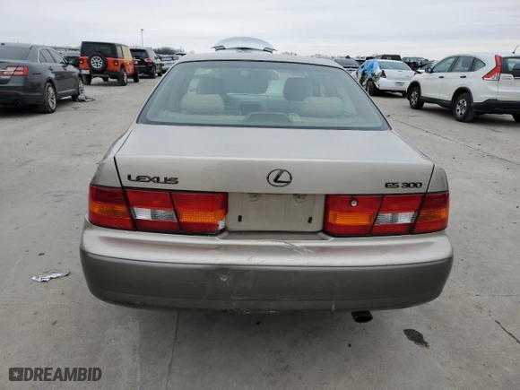 1999 Lexus ES 300 Luxury Sport Sdn with VIN JT8BF28G0X5069447, listed as a Copart auction lot 45074985 with 130,284 mi miles and Salvage Title. Bid and sale history available at carsss.com. Image 6.