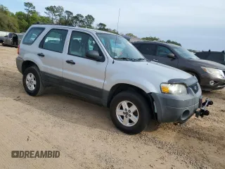 2005 Ford Escape XLS Value with VIN 1FMYU02Z35KB25309, listed as a Copart auction lot 50979315 with 117,908 mi miles and Salvage title. Bid and sale history available at DreamBid. Image 4.