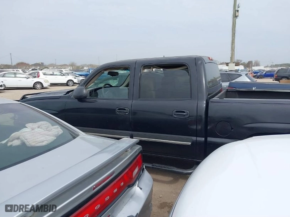 2006 Chevrolet Silverado 1500 LS with VIN 2GCEK13VX61299300, listed as a IAAI auction lot 41742351 with 194,576 mi miles. Bid and sale history available at carsss.com. Image 14.