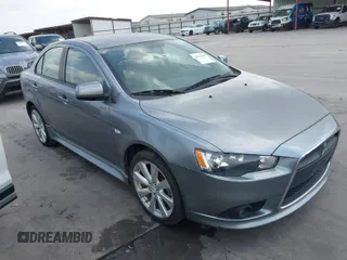 2013 Mitsubishi Lancer GT with VIN JA32U8FW1DU006295, listed as a IAAI auction lot 41977668 with 156,247 mi miles. Bid and sale history available at carsss.com. Image 1.