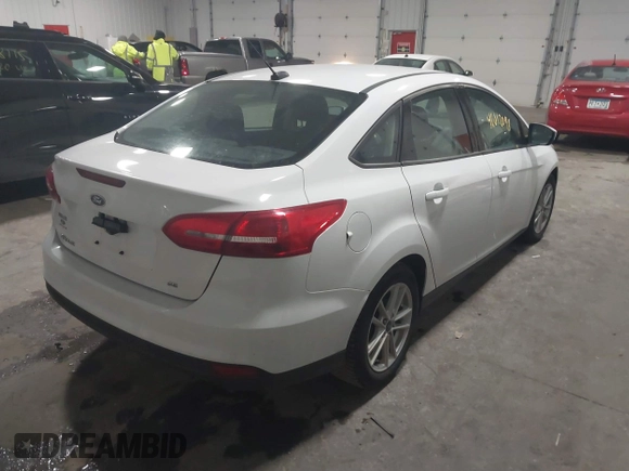 2018 Ford Focus SE with VIN 1FADP3F29JL312721, listed as a IAAI auction lot 41012098 with 126,214 mi miles. Bid and sale history available at carsss.com. Image 4.