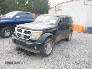 2007 Dodge Nitro SXT z VIN 1D8GU28K97W727361, wystawiony jako IAAI lot #42142970 z przebiegiem 144 579 mil mil oraz . Historia ofert i sprzedaży dostępna na DreamBid. Obrazek 2.
