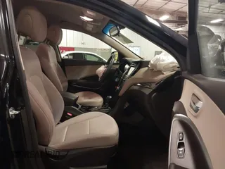 2017 Hyundai Santa Fe 2.4L with VIN 5NMZUDLBXHH041621, listed as a IAAI auction lot 42194586 with 91,012 mi miles and . Bid and sale history available at DreamBid. Image 5.
