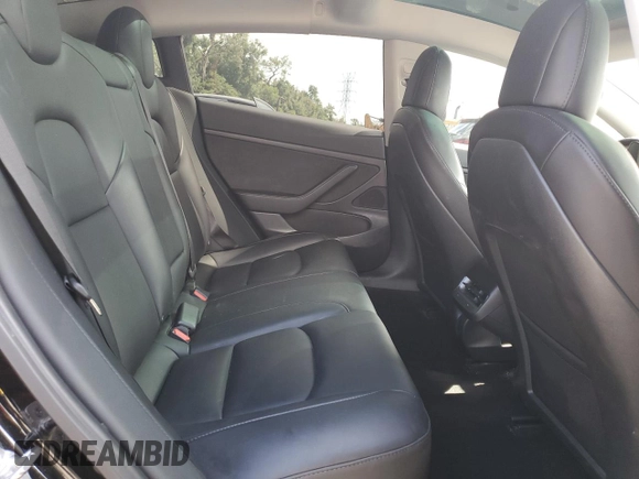 2021 Tesla Model 3 Standard Range Plus z VIN 5YJ3E1EA4MF942646, wystawiony jako Copart lot #56819945 z przebiegiem 39 599 mil mil oraz Nie do naprawy • Non repairable. Historia ofert i sprzedaży dostępna na DreamBid. Obrazek 10.