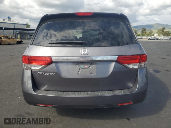 2015 Honda Odyssey LX with VIN 5FNRL5H27FB018491, listed as a Copart auction lot 54888445 with 129,488 mi miles and Salvage Title. Bid and sale history available at DreamBid. Image 6.