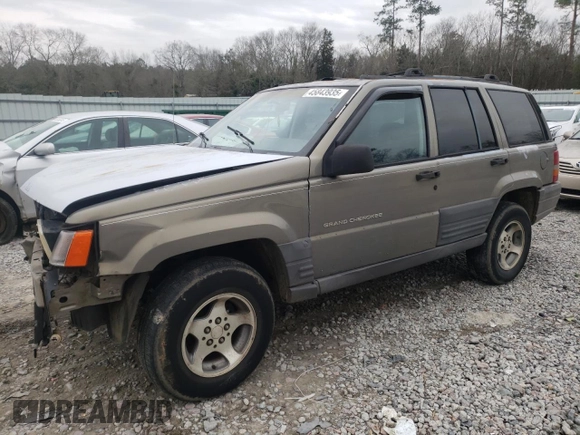 1996 Jeep Grand Cherokee Laredo with VIN 1J4FX58S5TC248122, listed as a Copart auction lot 45843935 with 295,521 mi miles and Salvage Title. Bid and sale history available at carsss.com. Image 1.
