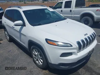 2015 Jeep Cherokee Latitude with VIN 1C4PJLCB7FW790865, listed as a IAAI auction lot 42182034 with 161,642 mi miles and . Bid and sale history available at carsss.com. Image 1.
