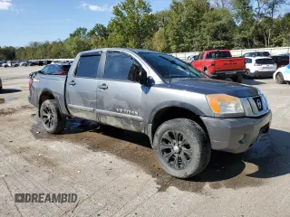 2015 Nissan Titan SL with VIN 1N6BA0EC5FN509230, listed as a Copart auction lot 73983574 with 144,288 mi miles and Salvage Title. Bid and sale history available at carsss.com. Image 4.