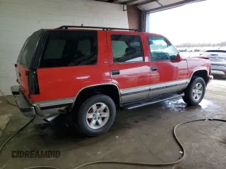 1999 GMC Yukon with VIN 1GKEK13R1XJ711537, listed as a Copart auction lot 51658175 with 228,786 mi miles and Salvage Title. Bid and sale history available at carsss.com. Image 3.