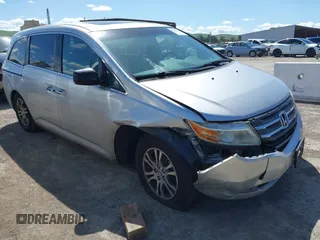 2012 Honda Odyssey EX-L z VIN 5FNRL5H62CB031535, wystawiony jako IAAI lot #41949106 z przebiegiem 281 345 mil mil oraz . Historia ofert i sprzedaży dostępna na DreamBid. Obrazek 1.
