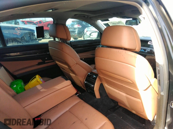 2011 BMW 7 Series 740i with VIN WBAKA4C55BC612634, listed as a IAAI auction lot 35404385 with 156,003 mi miles. Bid and sale history available at carsss.com. Image 8.