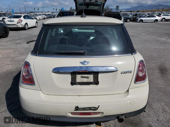 2012 MINI Hardtop with VIN WMWSU3C59CT542610, listed as a Copart auction lot 56720805 with 106,187 mi miles and Salvage Title. Bid and sale history available at DreamBid. Image 6.