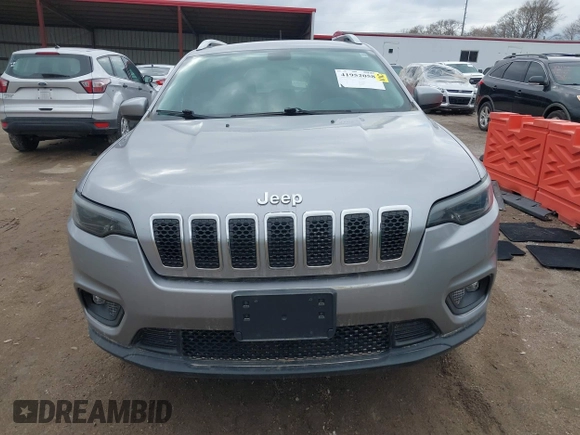2019 Jeep Cherokee Latitude z VIN 1C4PJMCB3KD459969, wystawiony jako IAAI lot #41952058 z przebiegiem 82 719 mil mil oraz . Historia ofert i sprzedaży dostępna na DreamBid. Obrazek 12.