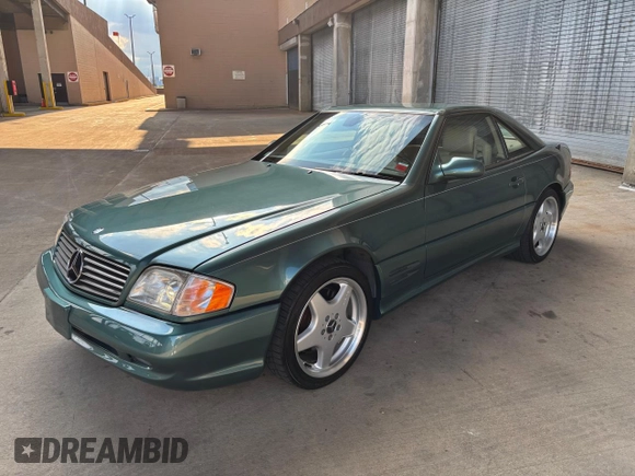 2002 Mercedes-Benz SL 500 with VIN WDBFA68F42F204673, listed as a Copart auction lot 56757525 with 32,967 mi miles and Clean title. Bid and sale history available at DreamBid. Image 2.