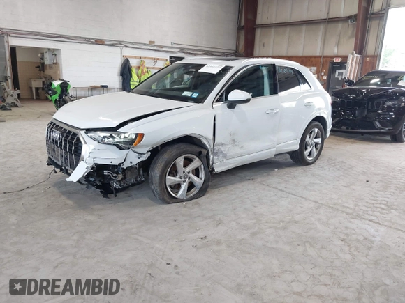 2020 Audi Q3 Premium with VIN WA1AECF3XL1090825, listed as a IAAI auction lot 42541577 with 32,432 mi miles and . Bid and sale history available at DreamBid. Image 2.