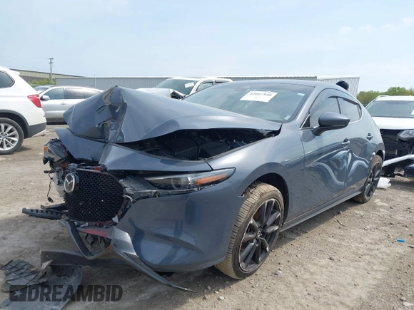 2020 Mazda 3 Premium with VIN JM1BPBNM3L1171285, listed as a IAAI auction lot 42097340 with 50,799 mi miles and . Bid and sale history available at DreamBid. Image 2.