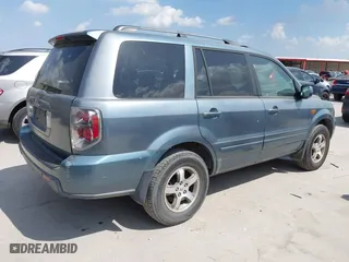 2007 Honda Pilot EX-L with VIN 5FNYF28597B037850, listed as a IAAI auction lot 41879048 with 194,089 mi miles. Bid and sale history available at carsss.com. Image 4.
