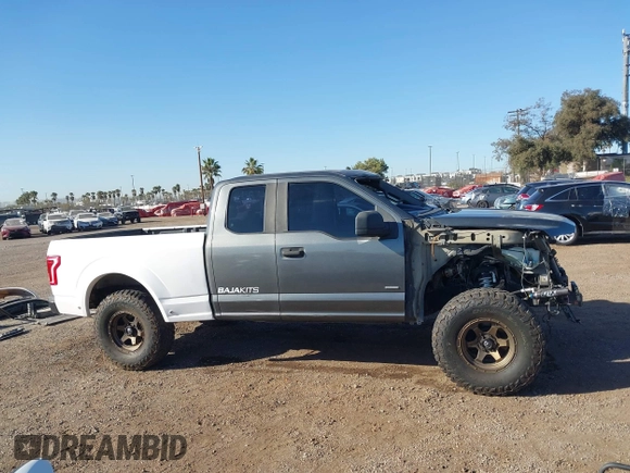 2015 Ford F-150 XL with VIN 1FTEX1CP3FKD43267, listed as a IAAI auction lot 41335186 with 137,766 mi miles. Bid and sale history available at carsss.com. Image 14.