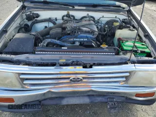 1995 Toyota T100 z VIN JT4VD22E1S0016497, wystawiony jako Copart lot #44385205 z przebiegiem 190 432 mil mil oraz Szkoda całkowita • Salvage title. Historia ofert i sprzedaży dostępna na DreamBid. Obrazek 11.