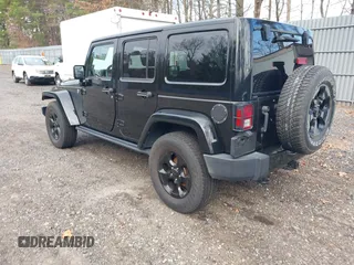 2015 Jeep Wrangler Unlimited Sahara with VIN 1C4HJWEG0FL661723, listed as a IAAI auction lot 41998393 with 89,077 mi miles. Bid and sale history available at carsss.com. Image 3.