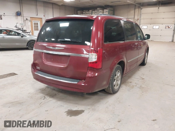 2012 Chrysler Town & Country Touring with VIN 2C4RC1BG1CR314023, listed as a IAAI auction lot 41078817 with Not Provided miles and . Bid and sale history available at DreamBid. Image 4.