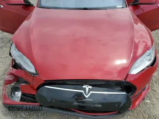2016 Tesla Model S 90D with VIN 5YJSA1E42GF127593, listed as a Copart auction lot 52450495 with 144,151 mi miles and Salvage title. Bid and sale history available at DreamBid. Image 12.