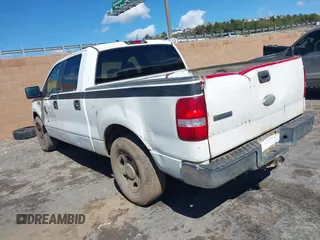 2005 Ford F-150 XLT with VIN 1FTRW12W65FA14163, listed as a IAAI auction lot 41754075 with 94,853 mi miles. Bid and sale history available at carsss.com. Image 3.