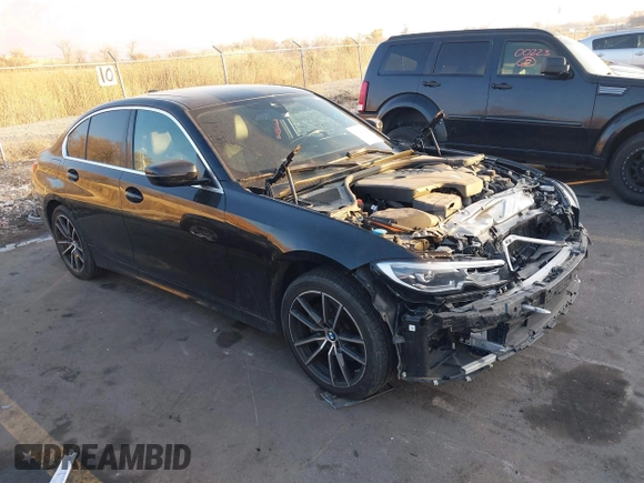 2022 BMW 3 Series 330i xDrive with VIN 3MW5R7J03N8C63077, listed as a IAAI auction lot 41043922 with 51,254 mi miles. Bid and sale history available at carsss.com. Image 1.
