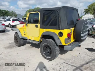 2002 Jeep Wrangler X z VIN 1J4FA39S82P719241, wystawiony jako IAAI lot #42150742 z przebiegiem 147 914 mil mil oraz . Historia ofert i sprzedaży dostępna na DreamBid. Obrazek 3.