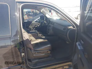 2011 Chevrolet Suburban LT with VIN 1GNSCJE06BR293634, listed as a IAAI auction lot 41742616 with 204,222 mi miles. Bid and sale history available at carsss.com. Image 5.