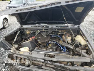 1988 Nissan Hardbody E z VIN 1N6ND16Y4JC384522, wystawiony jako Copart lot #64570204 z przebiegiem 10 784 mil mil oraz Szkody całkowita. Historia ofert i sprzedaży dostępna na DreamBid. Obrazek 11.