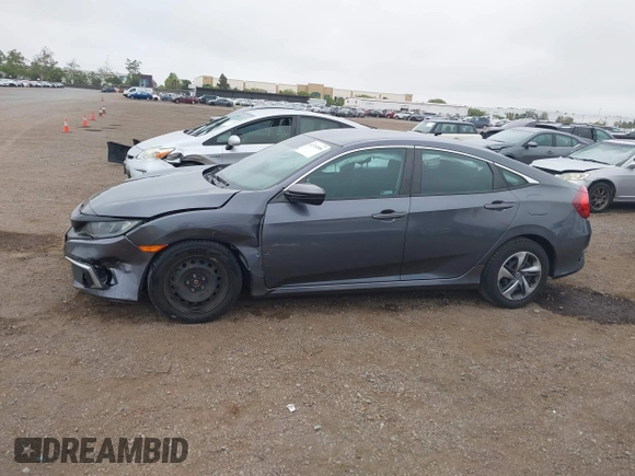 2020 Honda Civic LX with VIN 2HGFC2F63LH567698, listed as a IAAI auction lot 42354886 with 70,977 mi miles and . Bid and sale history available at DreamBid. Image 15.