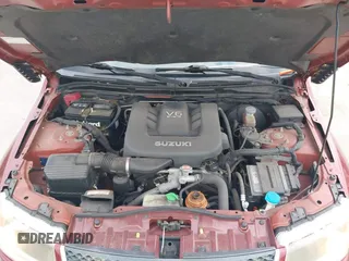 2008 Suzuki Grand Vitara w/Spare & Cargo Covers z VIN JS3TD941784101146, wystawiony jako IAAI lot #42546416 z przebiegiem 83 064 mil mil oraz . Historia ofert i sprzedaży dostępna na DreamBid. Obrazek 10.