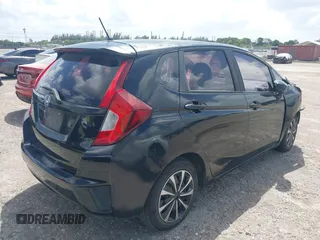 2016 Honda Fit LX with VIN JHMGK5H58GX002388, listed as a IAAI auction lot 41957350 with 127,211 mi miles. Bid and sale history available at carsss.com. Image 4.