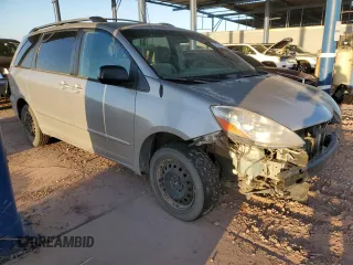 2010 Toyota Sienna CE with VIN 5TDKK4CC6AS329753, listed as a Copart auction lot 54374515 with 144,654 mi miles and Salvage Title. Bid and sale history available at DreamBid. Image 4.