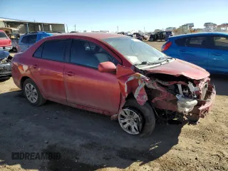 2012 Toyota Yaris with VIN JTDBT4K37C1419301, listed as a Copart auction lot 46705025 with 201,884 mi miles and Salvage Title. Bid and sale history available at DreamBid. Image 4.