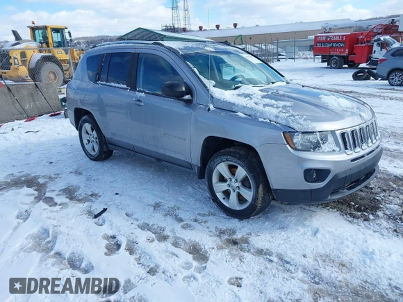 2015 Jeep Compass Sport with VIN 1C4NJDBB1FD206616, listed as a IAAI auction lot 41595052 with 112,836 mi miles. Bid and sale history available at carsss.com. Image 1.